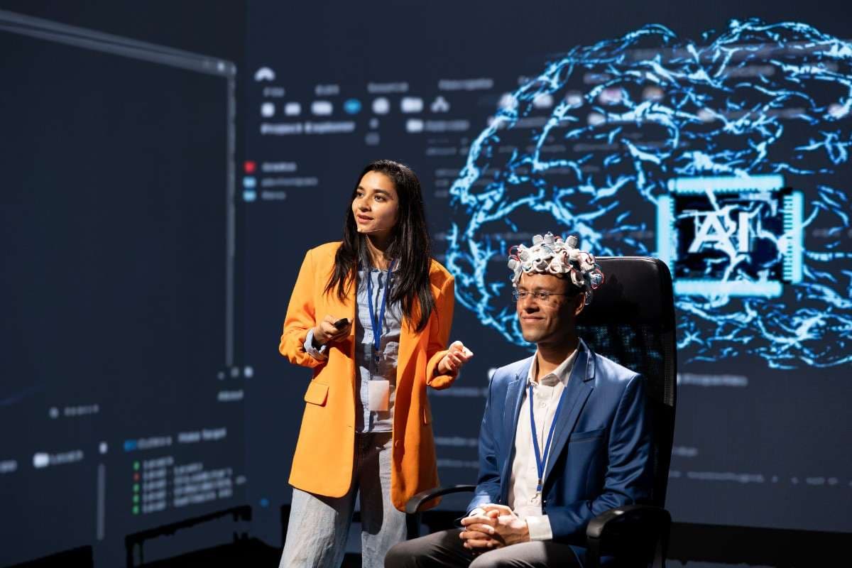 Data researchers presenting advanced computer vision headset technology